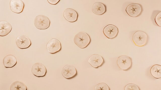 Minimalist Beige Background: Pattern of Sliced Apples, Flat Lay, Organic Texture, Healthy Food Concept.
