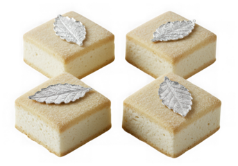 Elegant square pastries with silver leaf decorations