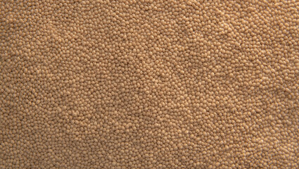 Mediterranean raw bulgur grains background, perfect for culinary and food photography designs