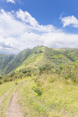 Fototapeta premium Valley of the Chillos, Ecuador - June 9, 2025: Summit of Ilalo Volcano or where the Ilalo milestone is located, seen from the Ilalo Cross.