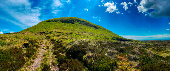 mountain landscape with blue sky and clouds
