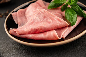 Ham slices meat spam pork fresh delicious gourmet food background on the table rustic food top view copy space