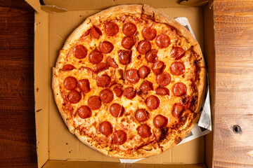 Pepperoni pizza in a box