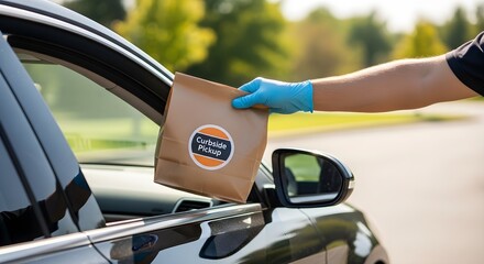 Safe and convenient curbside pickup concept. Worker wearing gloves delivers order to a car. Focus on health and safety measures during delivery service.