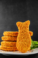 Fish sticks fishs shaped breaded fish nuggets fast food fresh delicious gourmet food background on the table rustic food top view copy space