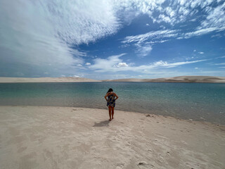 Brazil, Barreirinhas- 2023, May: women, lagoon and sand dunes in lençóis maranhenses