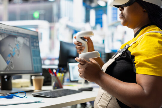 Black woman technician testing solar panel designs on VR headset, using digital industrial software to work in alternative energy manufacturing plant. Engineer optimizing the production line.