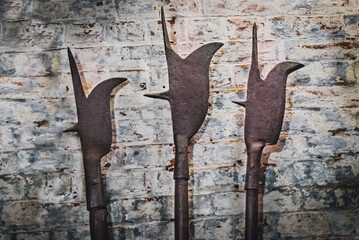 Close up of ancient medieval spears, lances, javelins at Westgate Tower in Canterbury, UK.