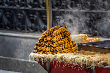 Turkish street food, corn on the cob, roasted on a coal grill, Istanbul, Turkey