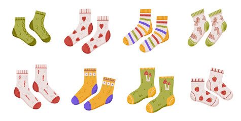 Warm knitted sock pair for autumn and winter weather with cute print: heart, flower, stripes. Cozy woolen socks in flat style