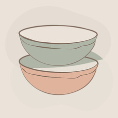 Two stacked bowls in pastel colors peach mint green.