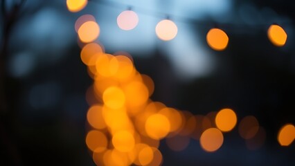 Soft, glowing lights in warm sunset hues create a dreamy and romantic outdoor atmosphere.