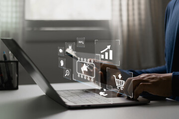 Person working on laptop with digital marketing automation. AI-driven strategies, data tracking, CRM systems, and modern advertising for business growth, lead generation, customer targeting in online.
