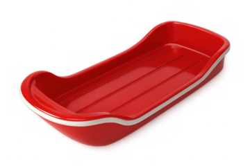Red plastic sled glistening against transparent backdrop, highlighting winter recreation and festive design potential
