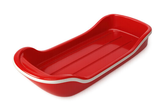 Red plastic sled glistening against transparent backdrop, highlighting winter recreation and festive design potential