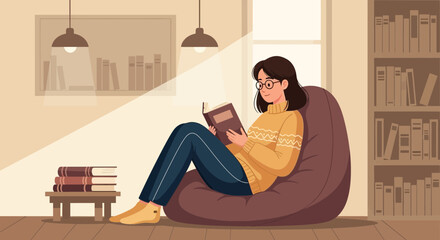 Relaxed Young Woman Enjoys Reading a Book on a Comfortable Beanbag