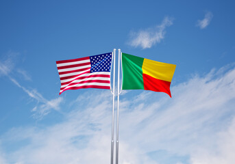 flags of  benin and United States of America over blue sky background.