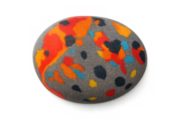 Gray oval stone decorated with colorful spots of red, orange, yellow, black and blue paint on a transparent background
