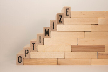 inscription OPTIMIZE. the inscription on the cubes