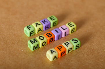 Words 'Fake Mobile Apps' Diagonally – Visual Metaphor for Online App Scams