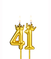 Golden candle with crown number 41 - White background