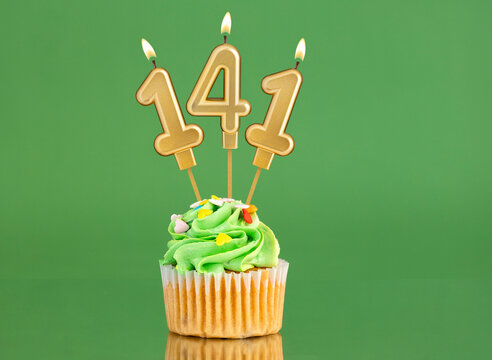 Birthday card with candle and cupcake - Number 141 on a green background