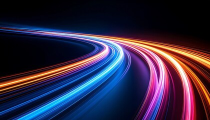 Abstract vibrant light trails on a dark curved road