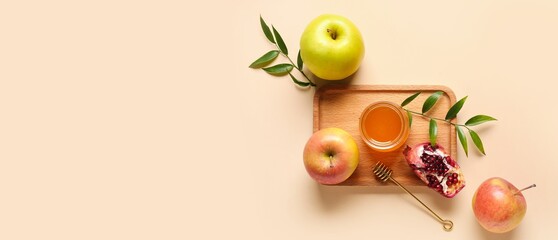 Composition for Rosh Hashanah (Jewish New Year) celebration on beige background with space for text