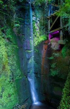 Floodlit waterfall is tallest on the Isle of Wight in Shanklin Cline a tourist attraction in a wooded gorge