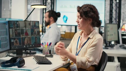 Woman engaging in discussion on video call to share finance strategy details, using data analysis to create a briefing for reports. Building an effective partnership via conferencing. Camera B. - Powered by Adobe