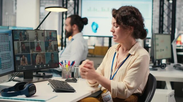 Woman engaging in discussion on video call to share finance strategy details, using data analysis to create a briefing for reports. Building an effective partnership via conferencing. Camera B.