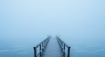 Obraz premium Frozen Lake with Wooden Pier in White Fog for Serene Wintry Landscape