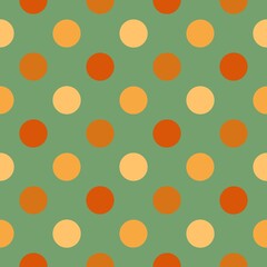 A repeating pattern of orange and peach polka dots is set against a muted green background. The evenly spaced circles create a harmonious and balanced design.