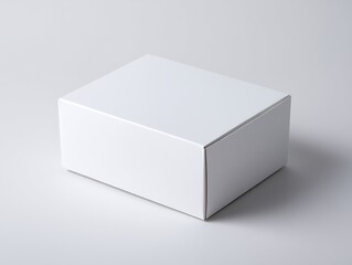 Fototapeta premium Clean white product box ready for custom branding and packaging design on a neutral background