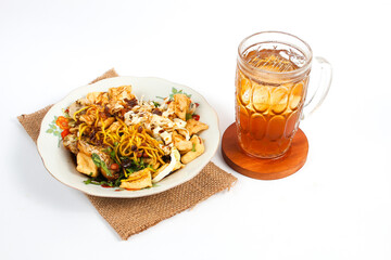 Traditional food and drink menu in the form of Solo tofu kupat and sweet iced tea isolated on a white background