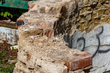 Ruins of a brick structure in an abandoned park