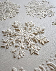 Close Up of Embossed White Snowflakes on Off White Background