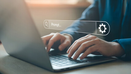 Typing a prompt into search bar on laptop for AI solutions and automation