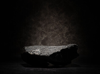 textured stones for podium background stands.real stones on dark background for cosmetic...