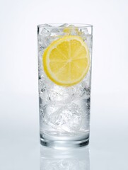 lemonade cocktail in a tall glass with a lemon wheel garnish on white background 