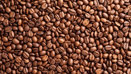 Fototapeta premium Aromatic roasted coffee beans background, rich texture for culinary designs