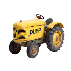 Obraz premium Nostalgic charm: A vintage yellow dump tractor toy on a dark background