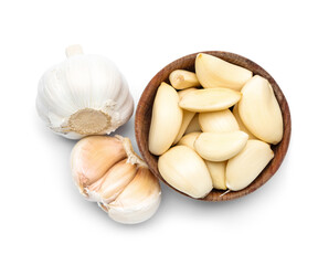 Wooden bowl with fresh garlic cloves on white background