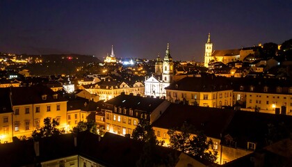 Prague Nightscape Golden City Lights and Historic Architecture Under Dark Sky.