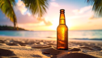 Amber beer bottle on a tropical beach at sunset