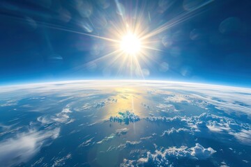 The sun rising over the earth sunlight space sky.