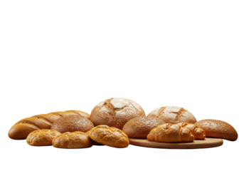 Freshly baked assorted bread rolls on a wooden board with a soft focus background