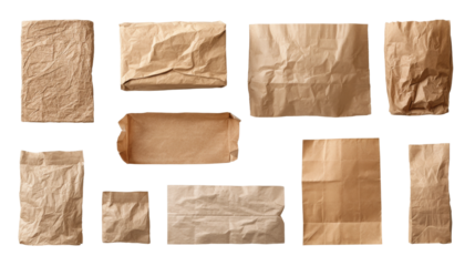 Assortment of brown paper grocery bags on transparent background.