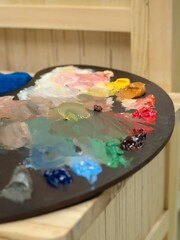 Palette filled with oil paint