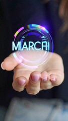 Hand holding a holographic month